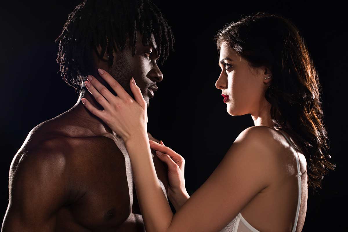 beautiful-seductive-interracial-couple-in-underwear-face-to-face-looking